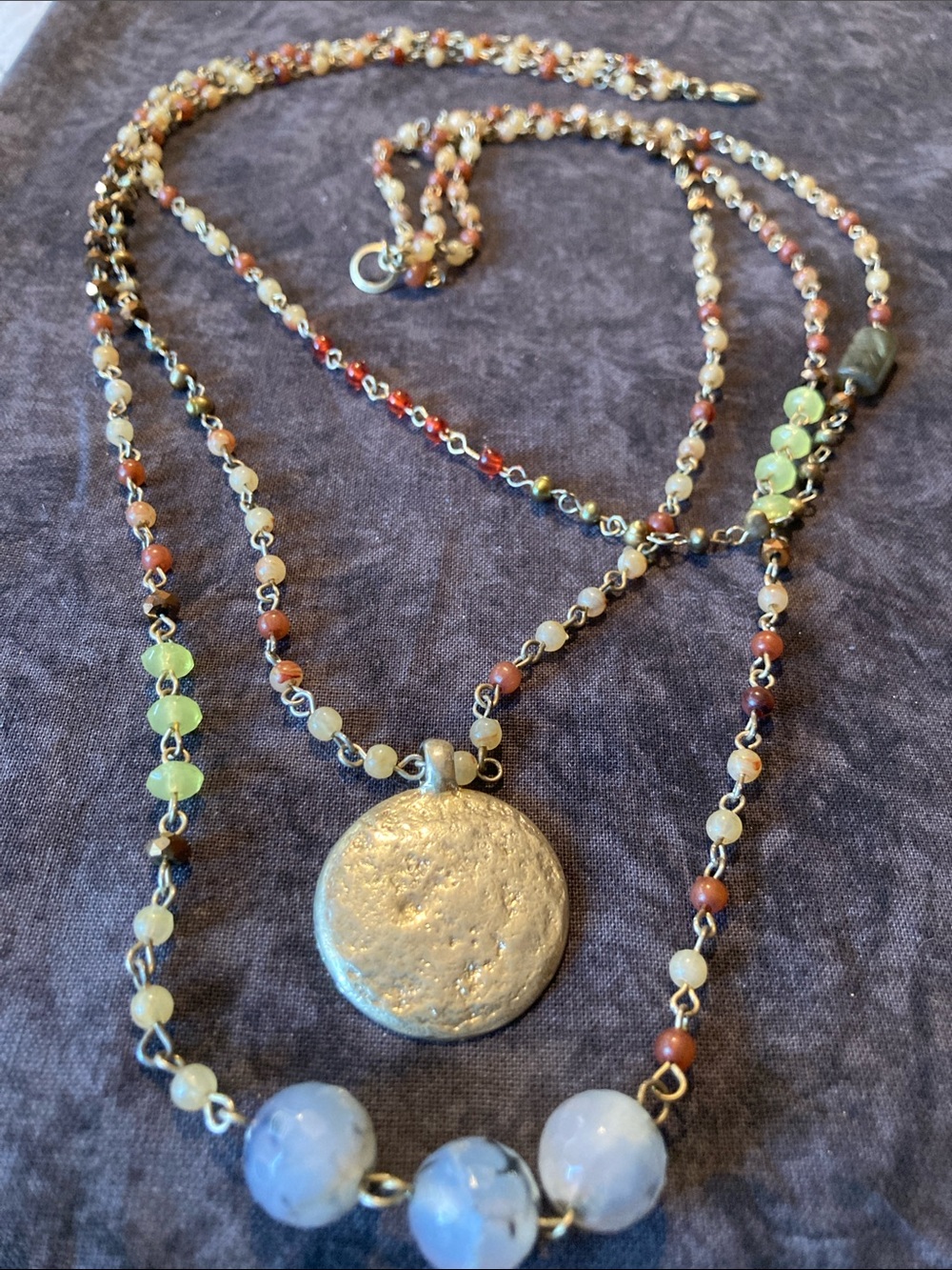 Multi-Strand Beaded Necklace with round and faceted beaded accents